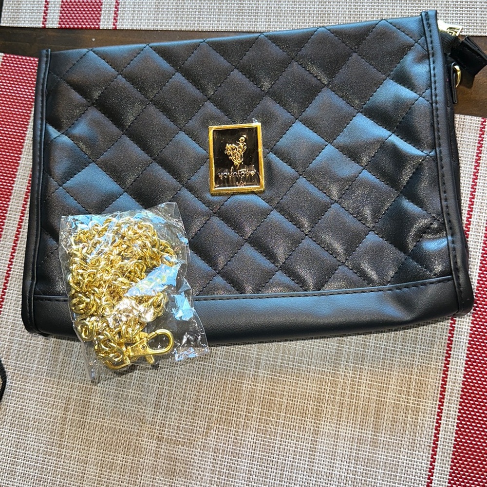 Brand new black clutch